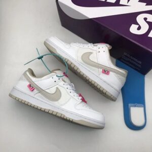 DUNK Low de alta versión, en blanco y rosa